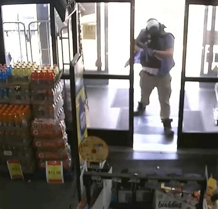 Chilling moment racehate shooter Ryan Palmeter storms Dollar General