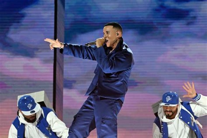 Daddy Yankee performing on stage Daddy Yankee performing on stage