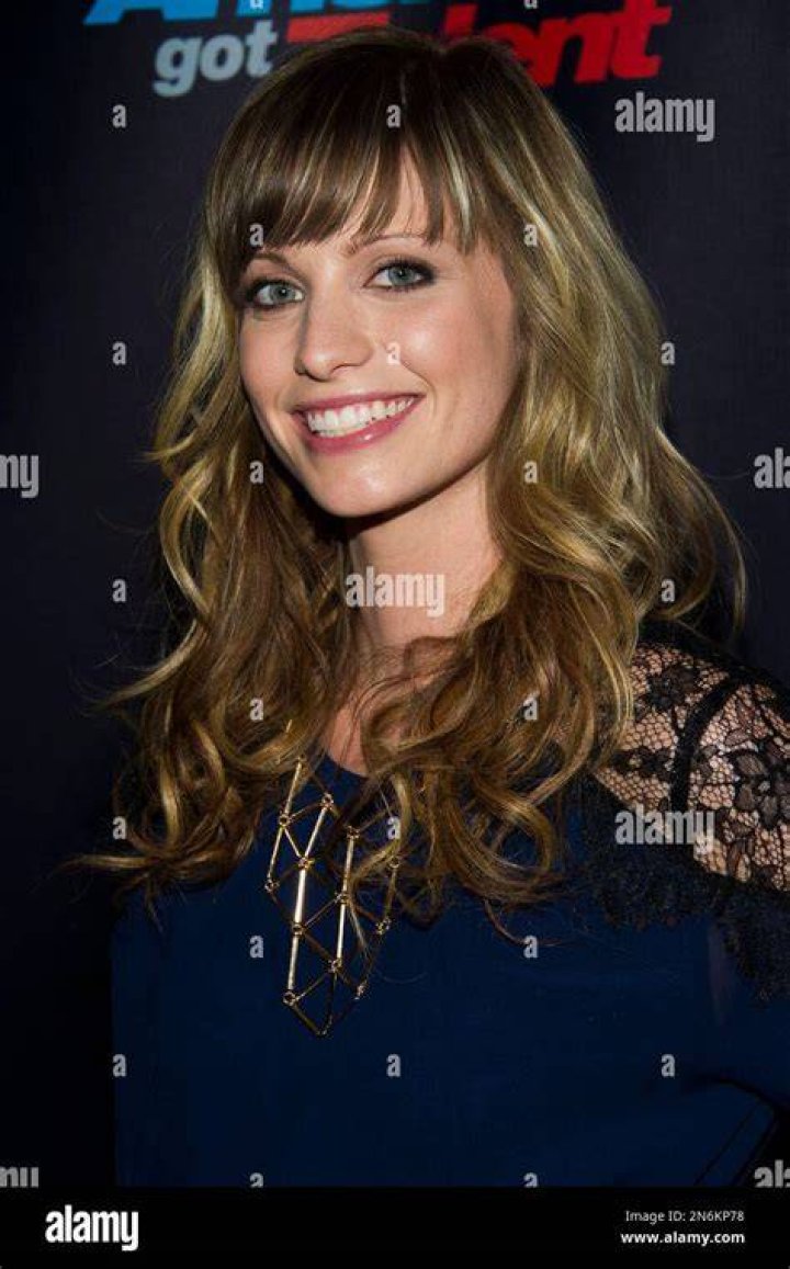 Singer Cami Bradley walks the preshow red carpet for "America's Got
